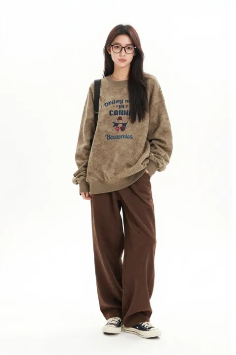 Transform into a long-haired woman wearing glasses, dressed in the same clothes, posing in the same way.