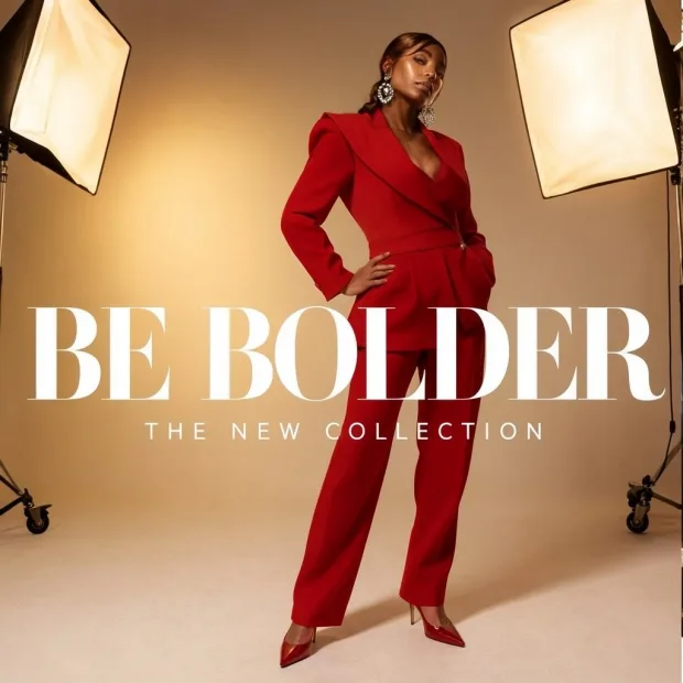 A high-fashion editorial photograph in a modern London studio: an adult woman in a scul… — Image generated by MOSS Image Text-To-Image API
